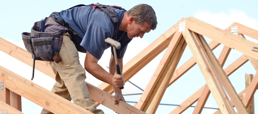 man working on the roof